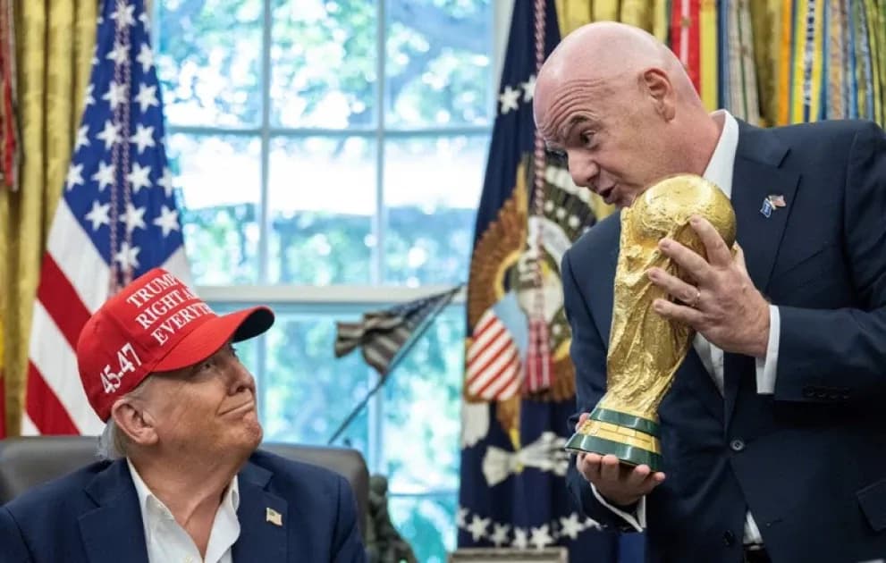 Donald Trump and FIFA president holding World Cup trophy