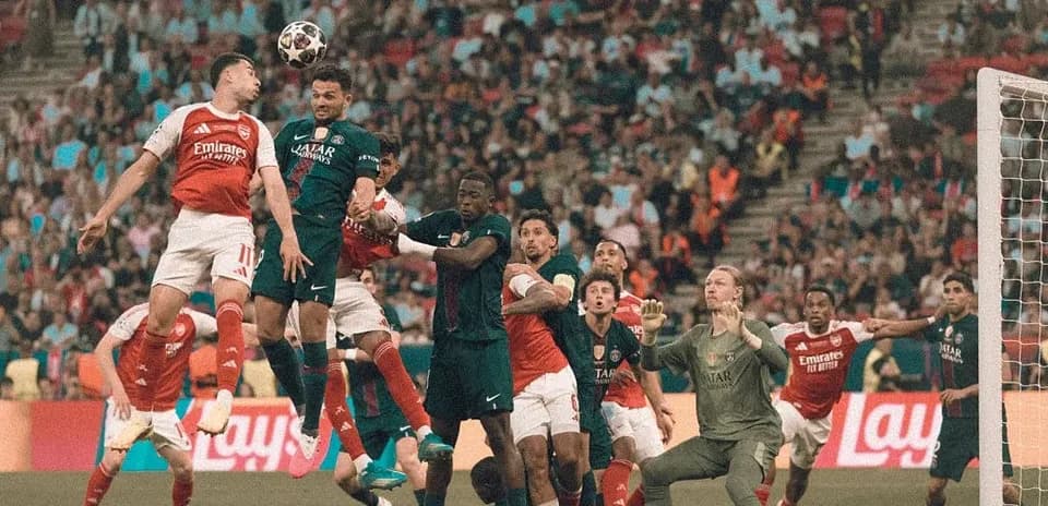 Players contesting a high ball in a match