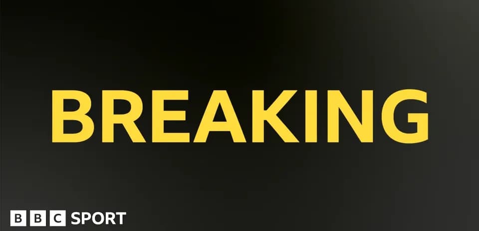 Текст 'BREAKING' на черном фоне