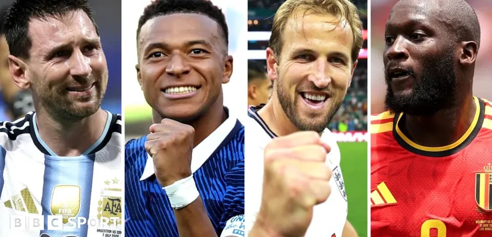 Four football players celebrating with raised fists