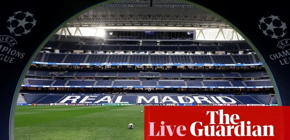 Стадион с надписью 'REAL MADRID' на поле