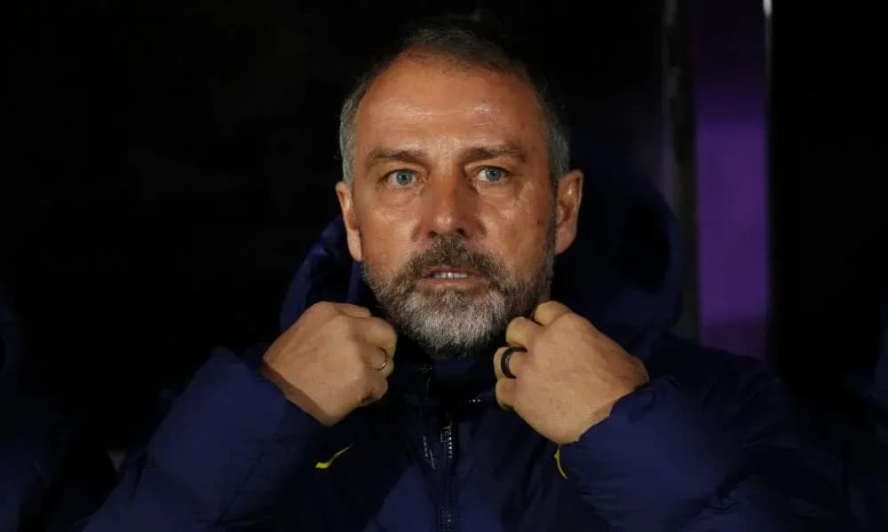 Тренер adjusting his jacket on the sidelines Тренер adjusting his jacket on the sidelines