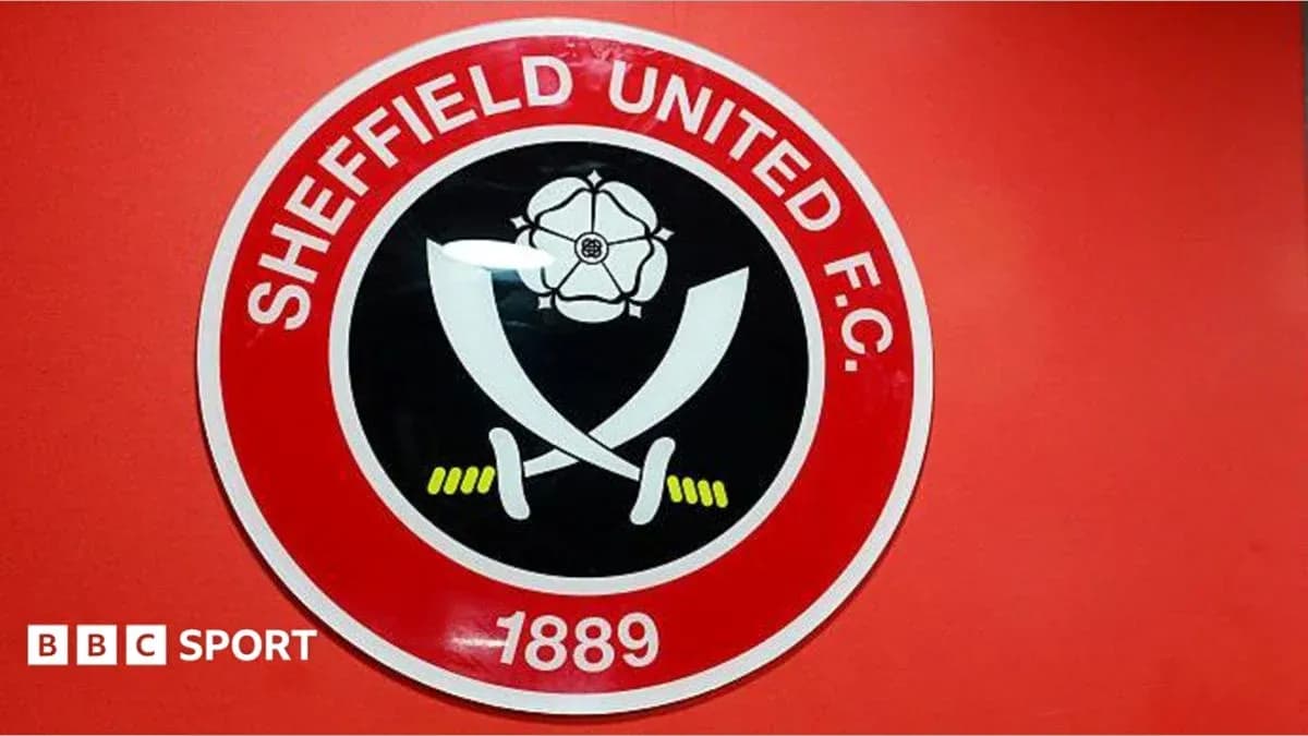 Логотип Sheffield United F.C. на красном фоне Логотип Sheffield United F.C. на красном фоне